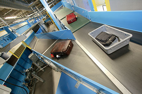 Ленточный конвейер - TRANSNORM SYSTEM GMBH - багажный / горизонтальный / наклонный