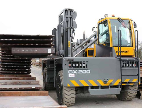 Дизельная подъемная тележка - GX series - Baumann Srl - электрическая / с местом для сидения водителя / 4-колесная